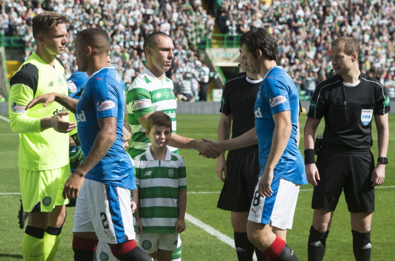 10/09/16 LADBROKES PREMIERSHIP .CELTIC v RANGERS .CELTIC PARK - GLASGOW .Celtic's Scott Brown shakes hands with Rangers' Joey Barton ahead of kick off