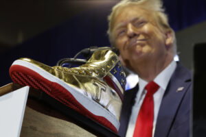 Presidential Candidate And Former President Donald Trump Attends Sneaker Con To Launch His New Shoe Line