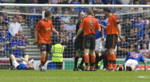 10/05/08 CLYDESDALE BANK PREMIER LEAGUE.RANGERS V DUNDEE UTD (3-1).IBROX - GLASGOW.The Dundee Utd players protest to referee Michael McCurry after Danny Swanson's disallowed goal.   (Photo by Jeff HolmesSNS Group via Getty Images)