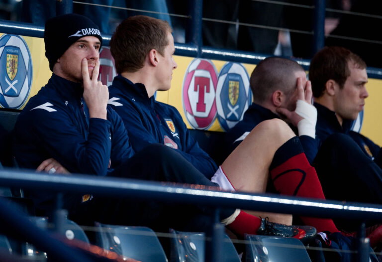 01/04/09 WORLD CUP QUALIFIER.SCOTLAND v ICELAND.HAMPDEN - GLASGOW.Barry Ferguson (left), Christophe Berra (second left), Allan McGregor (second right) and Steven Whittaker take their place on the Scotland bench   (Photo by Steve WelshSNS Group via Getty