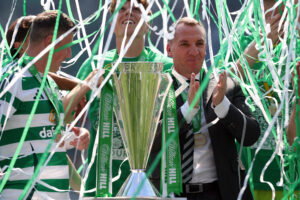 Rodgers with the league trophy. The gaffer supreme.