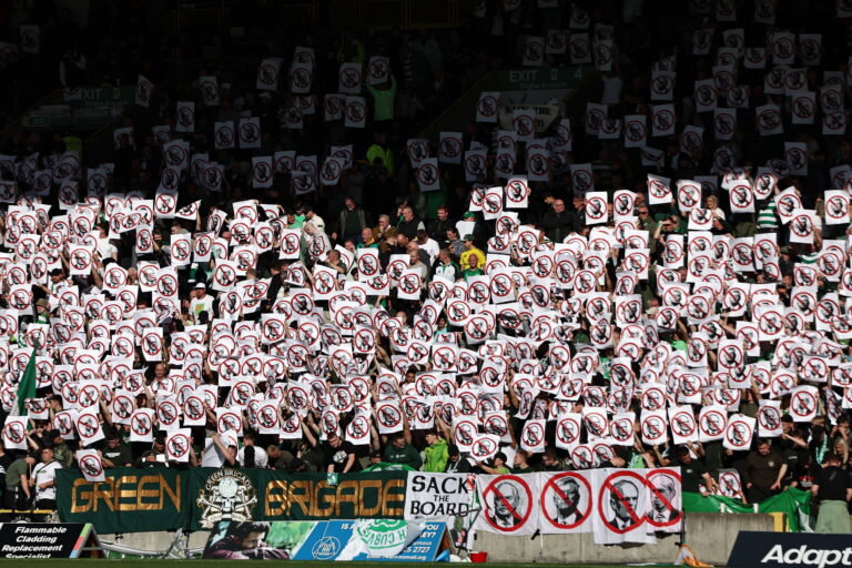 Celtic fan protests against the board.,