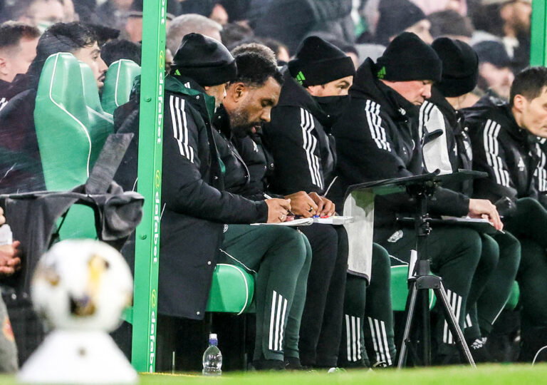 The Celtic boss studies his guides.