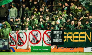 The Green Brigade. Celtic fans protest the club.