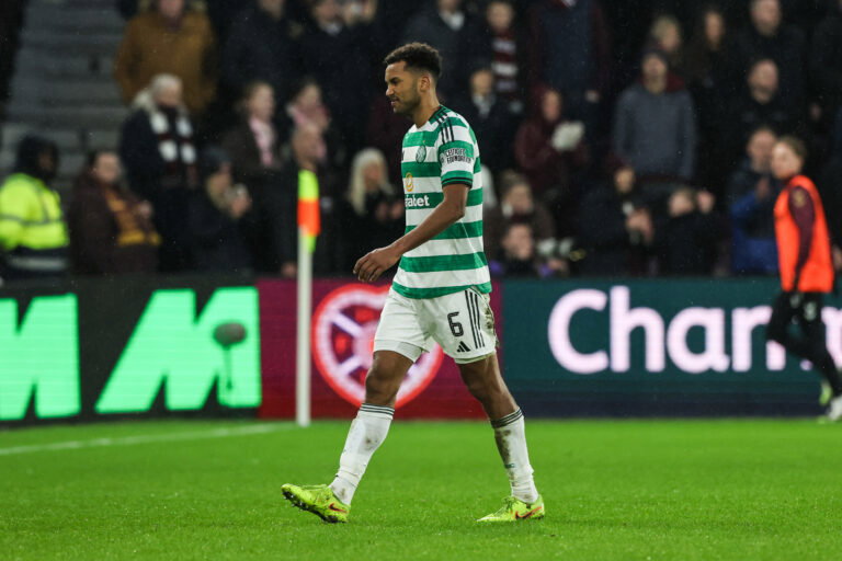 Celtic's Austin Trusty troops off after his red card.