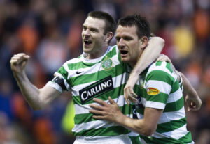 22/05/08 CLYDESDALE BANK PREMIER LEAGUE.DUNDEE UTD v CELTIC (0-1).TANNADICE - DUNDEE.Jan Vennegoor of Hesselink is congratulated by Celtic captain Stephen McManus (left) after opening the scoring   (Photo by Jeff HolmesSNS Group via Getty Images)