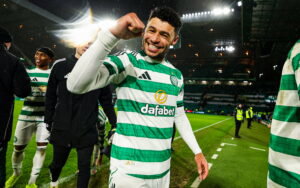 The big guy celebrates his first Celtic goal on a big night.