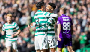 Celtic players celebrate the Ox getting his goal.